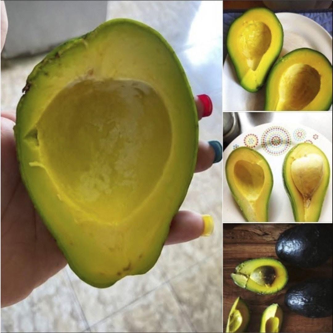Aguacates frescos en una tabla de cocina